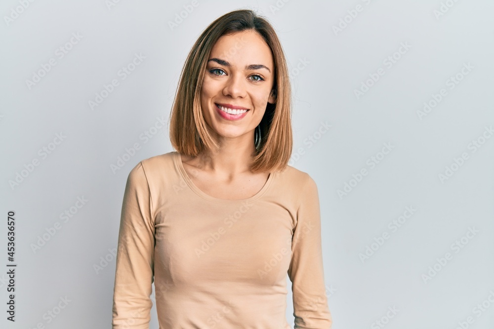 Obraz premium Young caucasian blonde woman wearing casual sweater with a happy and cool smile on face. lucky person.