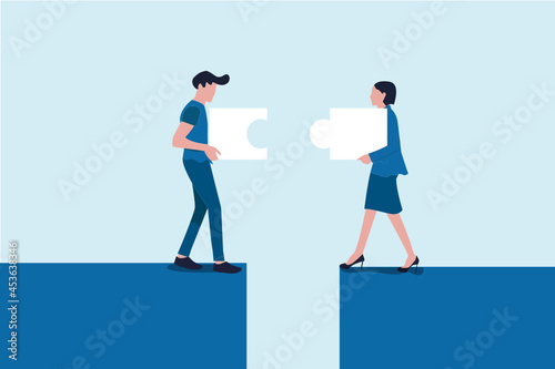 Business concept. Team metaphor. people connecting puzzle elements. Symbol of teamwork, cooperation, partnership. Putting a puzzle together. Teamwork men and women who assemble the puzzle.