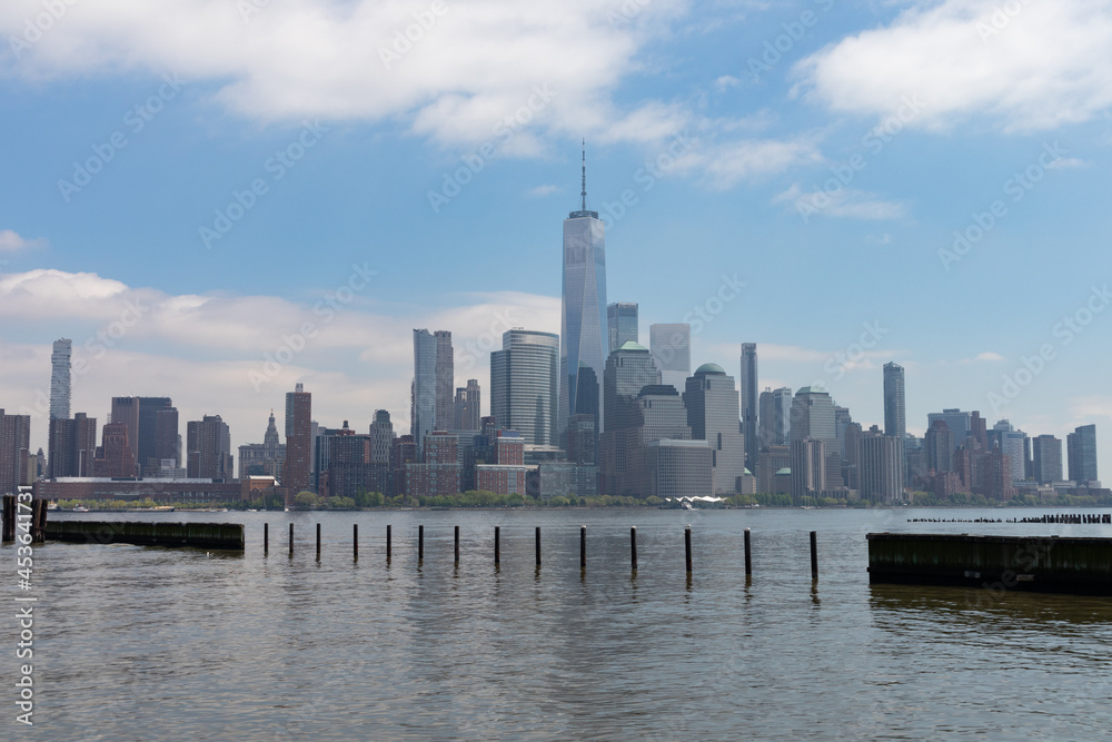Lower Manhattan New York City Skyline seen from the Shore of Jersey City New Jersey along the Hudson River