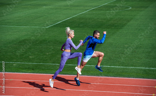 Sport. marathon speed. sport couple run fast to win. successful fitness sprinters.