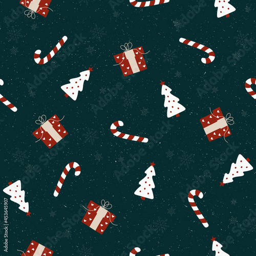 Merry Christmas. Hand drawn cute winter elements. Colored graphic vector seamless pattern. Holiday trendy illustration with candy cane, gift box, Christmas tree, snowflake. Cartoon style. Flat design