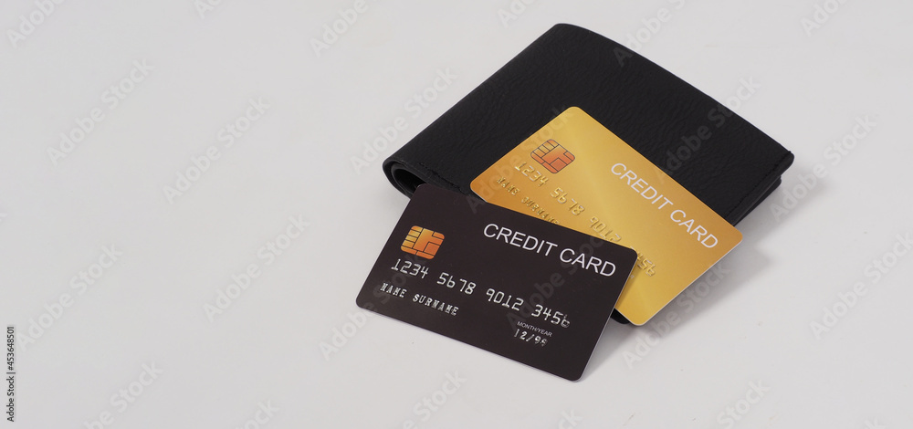 Credit card Black and gold color in black on wallet isolated on white background.. Credit card Black and gold color in black on wallet isolated on white background..