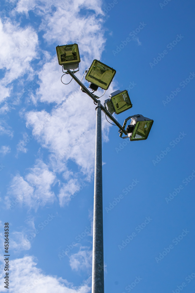court lighting lamp against the sky court lighting lamp against the sky