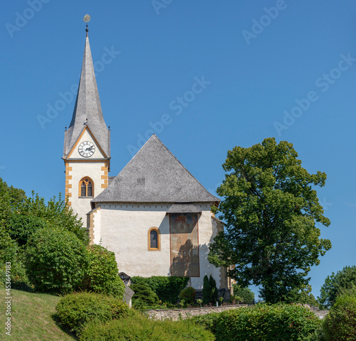 The Church of Maria Worth at Lake Worthersee in Carinthia, Austria in Summer. photo