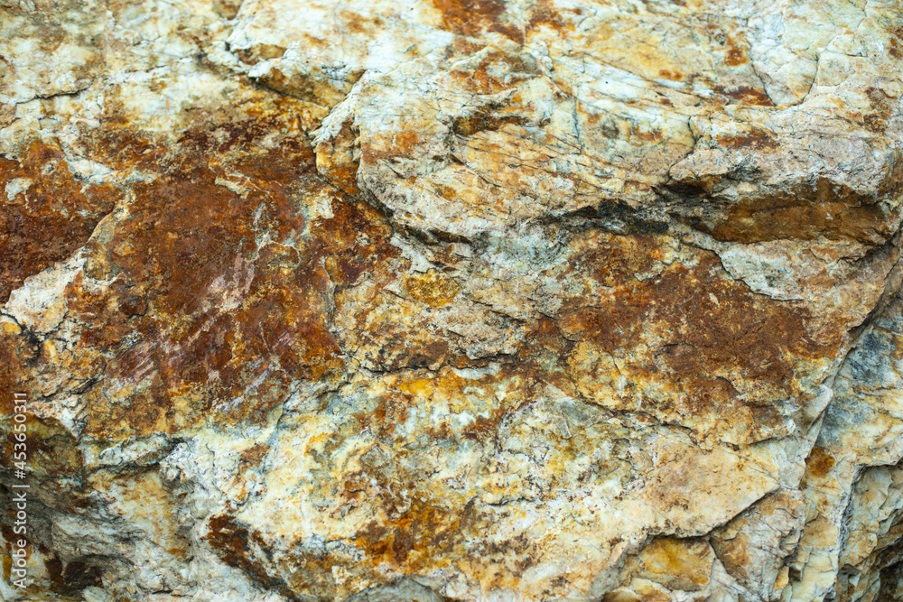 The texture of the stone in natural light. Rock details. The texture of the stone in natural light. Rock details.