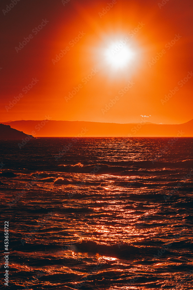 sunset over the sea, vertical landscape