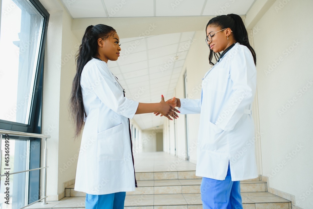 portrait of happy young african american nurses portrait of happy young african american nurses