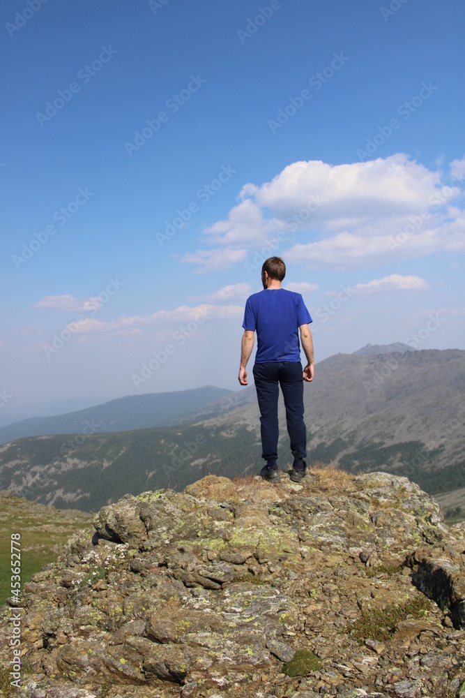 Fototapeta premium hiker on top of mountain