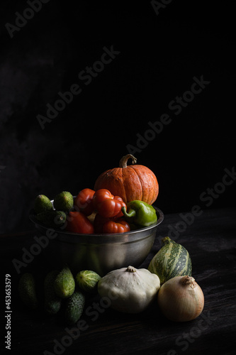 autumn still life in a rustic style on a dark wooden background