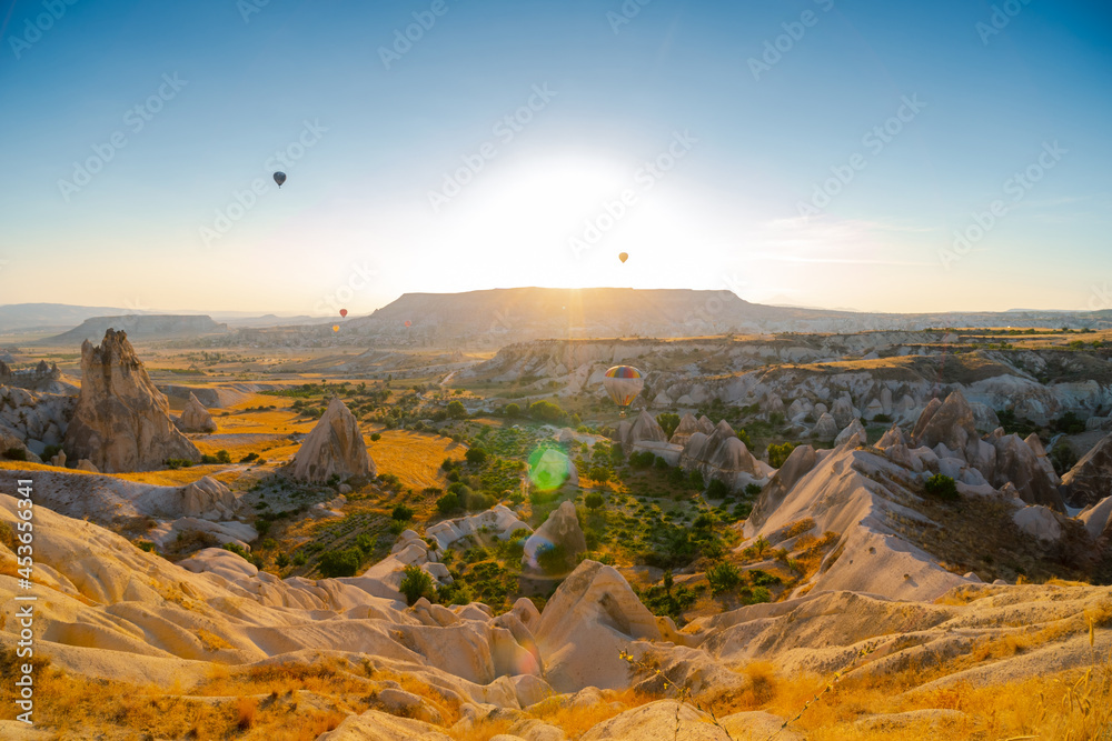The great tourist attraction of Cappadocia - balloon flight. Entertainment, tourism an vacation. Travel tour. Goreme, Cappadocia, Turkey.