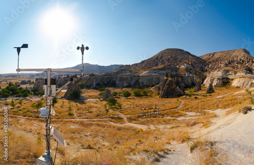 Anemometer in Meteorological weather station with blue sky and mountains background. meteorological equipment. Turkey Cappadocia photo