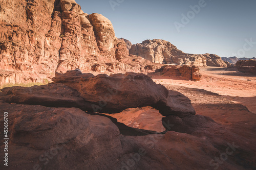 small arch in the dry and hot desert of Wadi Rum Jordan