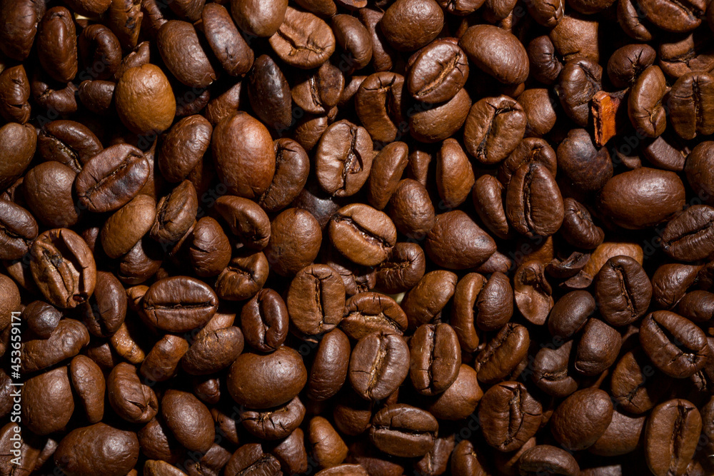 Macro image of roasted coffee beans. Can be used as a background Macro image of roasted coffee beans. Can be used as a background