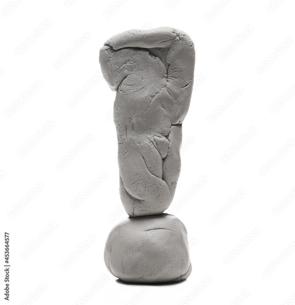 Grey modelling clay shaped in exclamation mark sculpture isolated on white background Grey modelling clay shaped in exclamation mark sculpture isolated on white background
