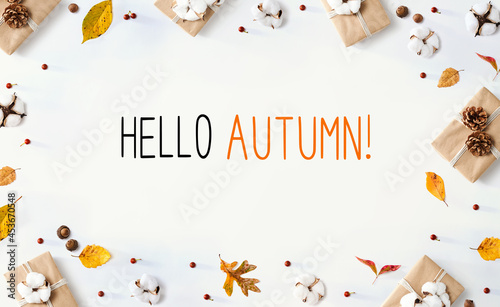 Hello autumn message with gift boxes with leaves