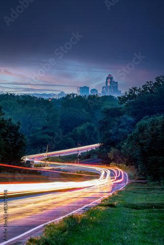 Traffic light trails to the Des Moines Skyline at sunset from Pleasant Hill.