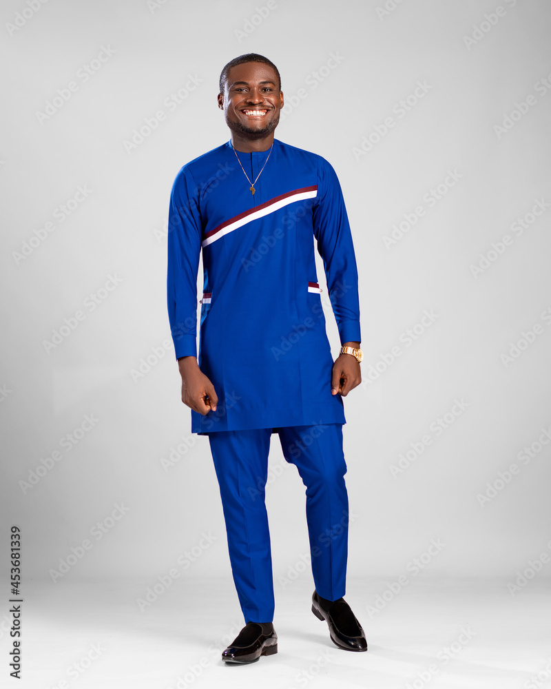 young african man dressed in stylish native attire smiling young african man dressed in stylish native attire smiling