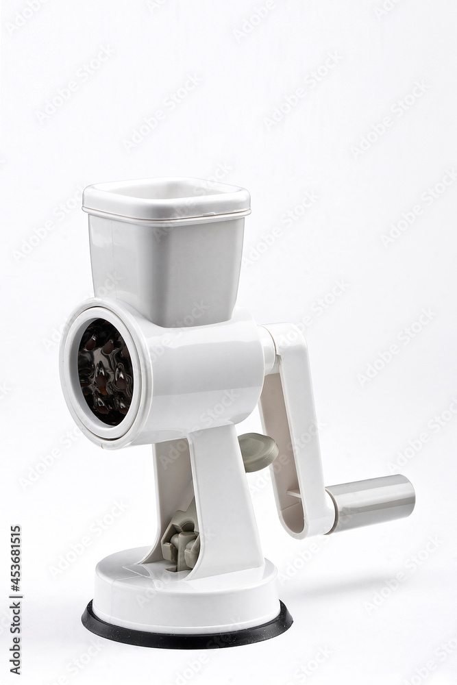 Kitchen mincer, food mill, food grinder isolated on white background with space for text Kitchen mincer, food mill, food grinder isolated on white background with space for text