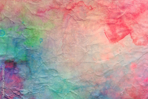 Watercolor background texture, pink blue green in abstract colorful background of crumpled paper design, pattern of wrinkled faded grunge stains on border, abstract watercolor painting