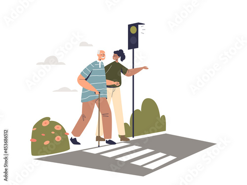 Young woman volunteer helping elder man cross street road on crosswalk. Girl walking with old male