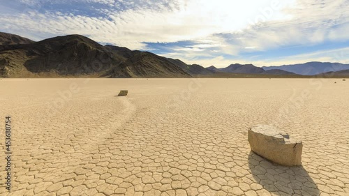 Time lapse of the clouds above the famous moving rocks on the Race Track dry lake in Death Valley