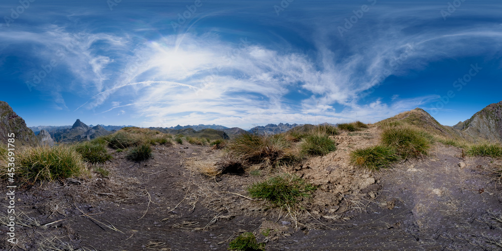 360 degree panoramic view of a mountain landscape with a cloudy sky. Pic des Moines