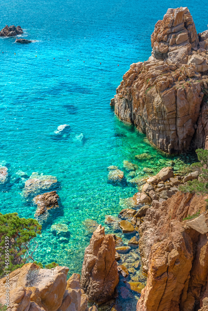 Crystal clear waters of Li Cossi beach, Sardinia