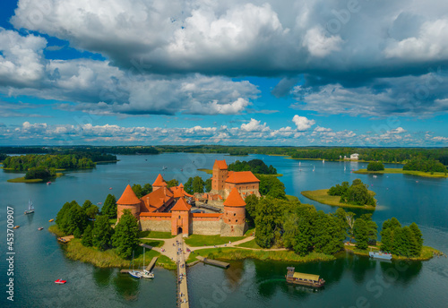 Aerial view of Trakai Island Castle - a medieval gothic castle located in Lithuania, on an island in Lake Galve. The construction begun in the 14th century and around 1409 major works were completed photo