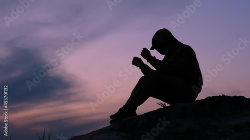Silhouette Man in depression, man has social problems, depressed and upset man photo