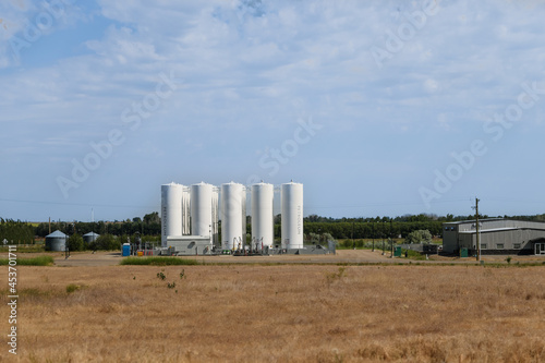 Petroleum storage tanks adjacent to the highway in the Alberta Prairies