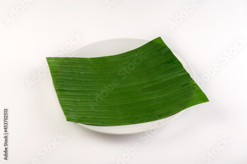 Banana Leaf on white plate isolated from white