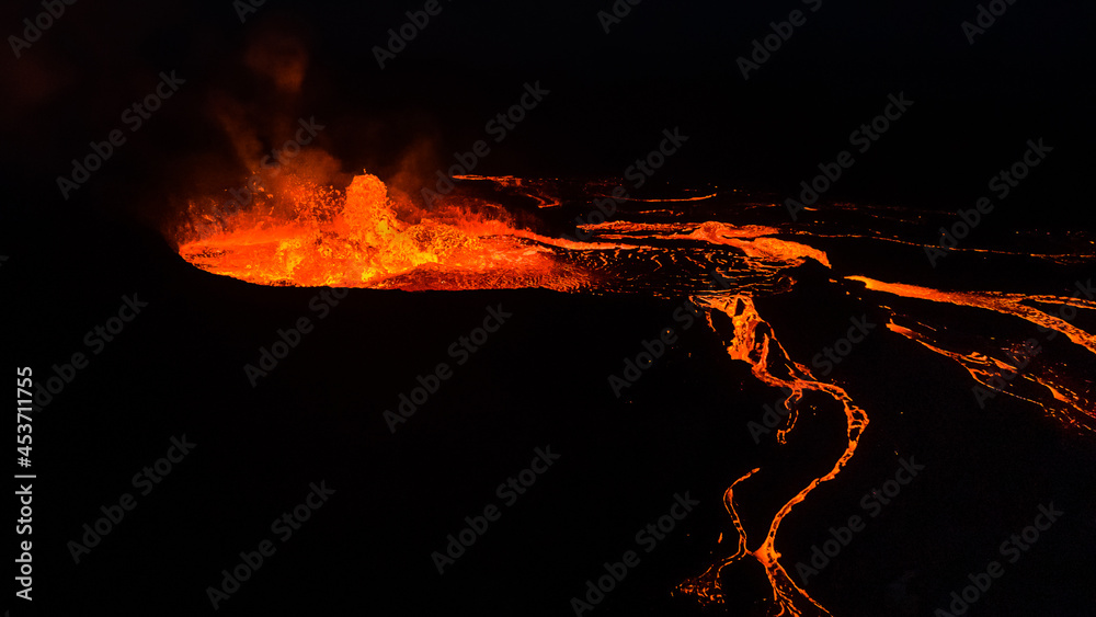 Beautiful aerial cinematic footage of the bowling lava exploding from the Active Volcano in Iceland