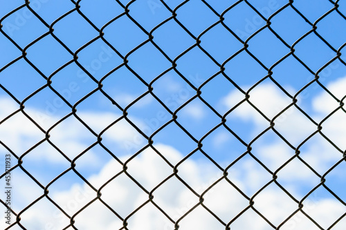 wire mesh on blue sky background