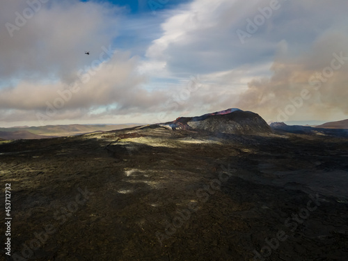 Beautiful aerial cinematic footage of the bowling lava exploding from the Active Volcano in Iceland © Gian