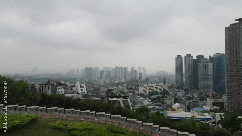 Aerial drone shot flying through Seoul city with a skyline view in South Korea Aerial drone shot flying through Seoul city with a skyline view in South Korea