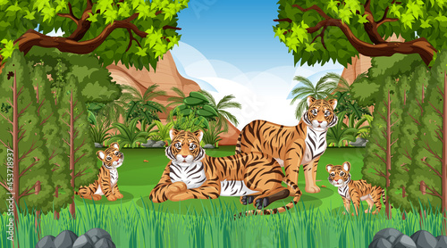 Tiger family in forest or rainforest scene with many trees