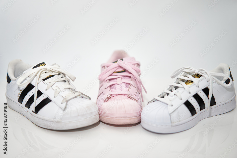bangkok,Thailand,July 2,2021-original adidas sneakers shoes with shoelace  half white and pink on white floor front view soft focus with copy space  Stock Photo | Adobe Stock