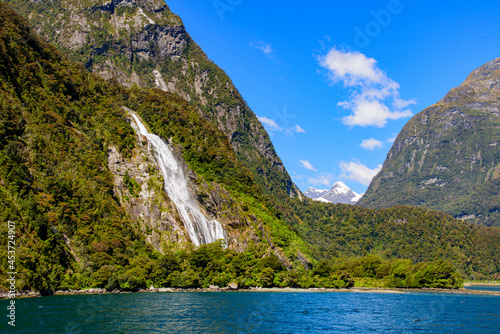 Beautiful scenic Milford Sound with blue sky, Fiordland, New Zealand