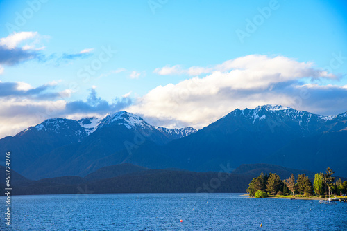 lake in Te Anau with mountain and blue sky, New Zealand