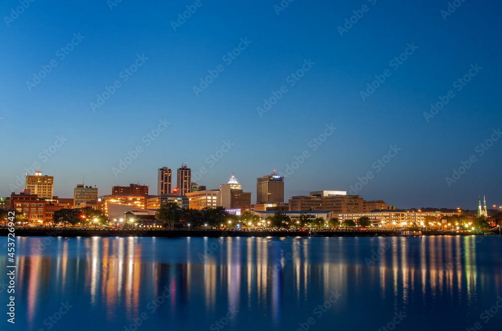 Downtown Peoria At Dusk With A Clear Sky (Some Corporate Signs Replaced With Fake Ones)