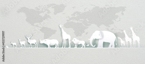 World Animals Day with world map deer, elephant, lion, giraffe.