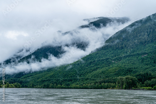 foggy mountains over the river