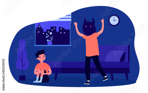 Guy in mask of monster scaring little boy. Flat vector illustration. Brother or friend in scary mask attacking frightened child sitting on floor in dark room. Fear, nightmare, prank, phobia concept