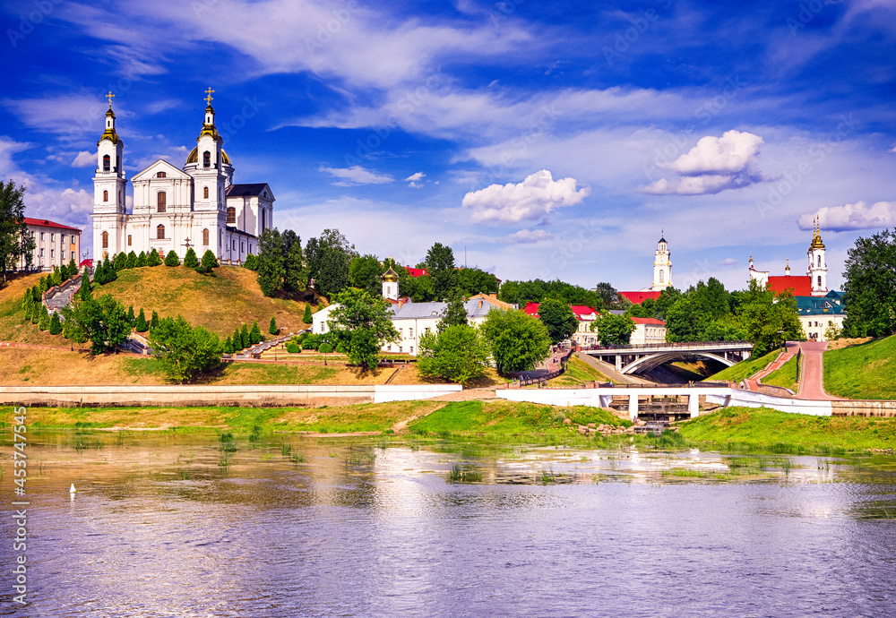 Travel Destinations Concepts. Cityscape of The Holy Assumption Cathedral, Resurrection Church With Holy Spirit Convent Across the Western Dvina River.