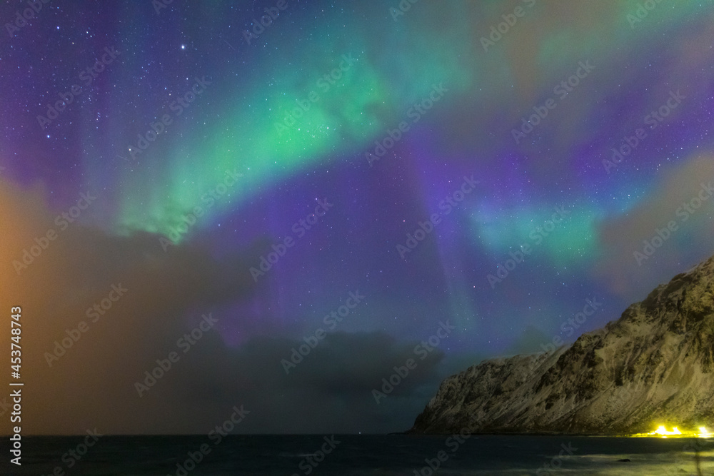 Magnificent Picturesque Aurora Borealis Lights Also Known as Nother Lights Playing with  Colors At Lofoten Islands in Norway.