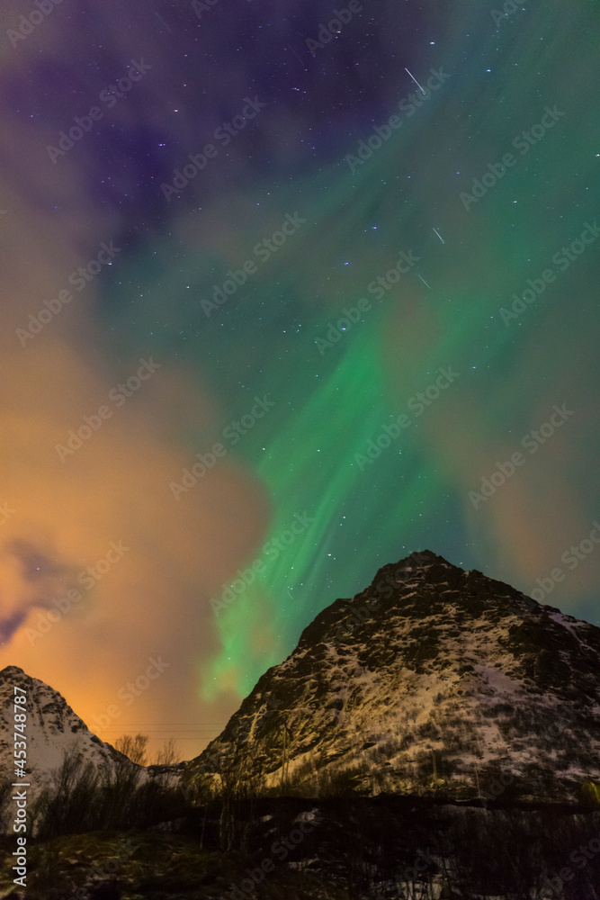 Night Nothern Lights Also Known as Aurora Borealis Lights Also Known as Nother Lights Playing with  Colors At Lofoten Islands in Norway.