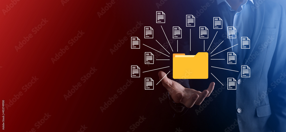 Document Management System DMS .Businessman hold folder and document icon.Software for archiving, searching and managing corporate files and information.Internet Technology Concept.Digital security. Document Management System DMS .Businessman hold folder and document icon.Software for archiving, searching and managing corporate files and information.Internet Technology Concept.Digital security.