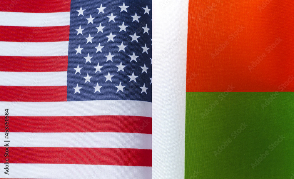 Fototapeta premium fragments of the national flags of the United States and Republic of Madagascar in close-up