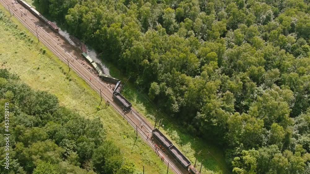 Arial view. Train accident. Rescue relief works in progress locomotive derailed