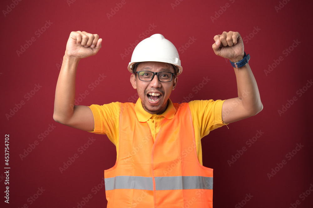Young Asian construction man happy satisfied smiling expression Man happy face Happiness concept Young Asian construction man happy satisfied smiling expression Man happy face Happiness concept